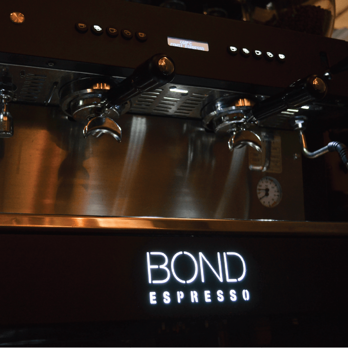 Bond Espresso 2 Group commercial espresso machine with twin steam wands, hot water outlet, and stainless steel body.