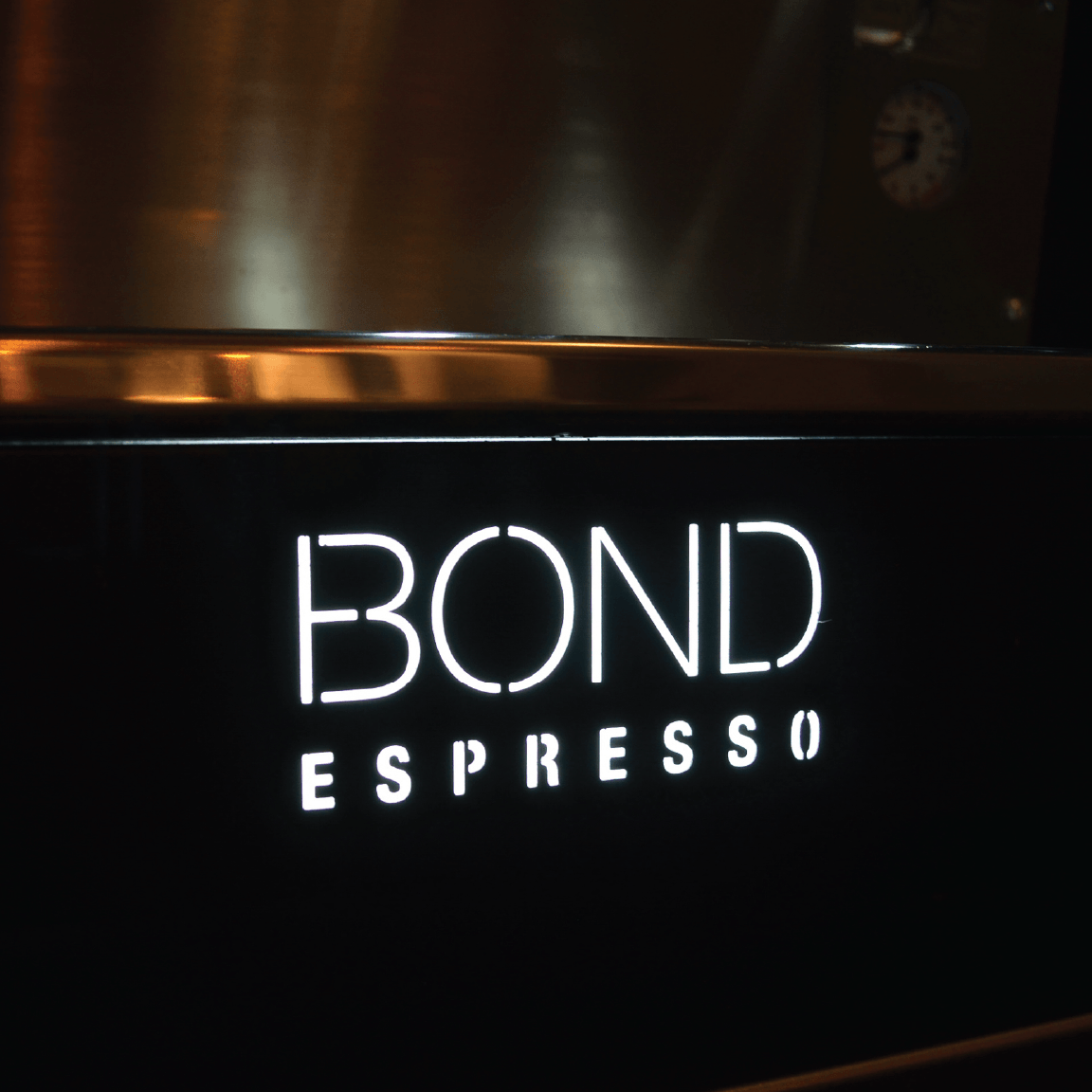 Bond Espresso 2 Group commercial espresso machine with twin steam wands, hot water outlet, and stainless steel body.