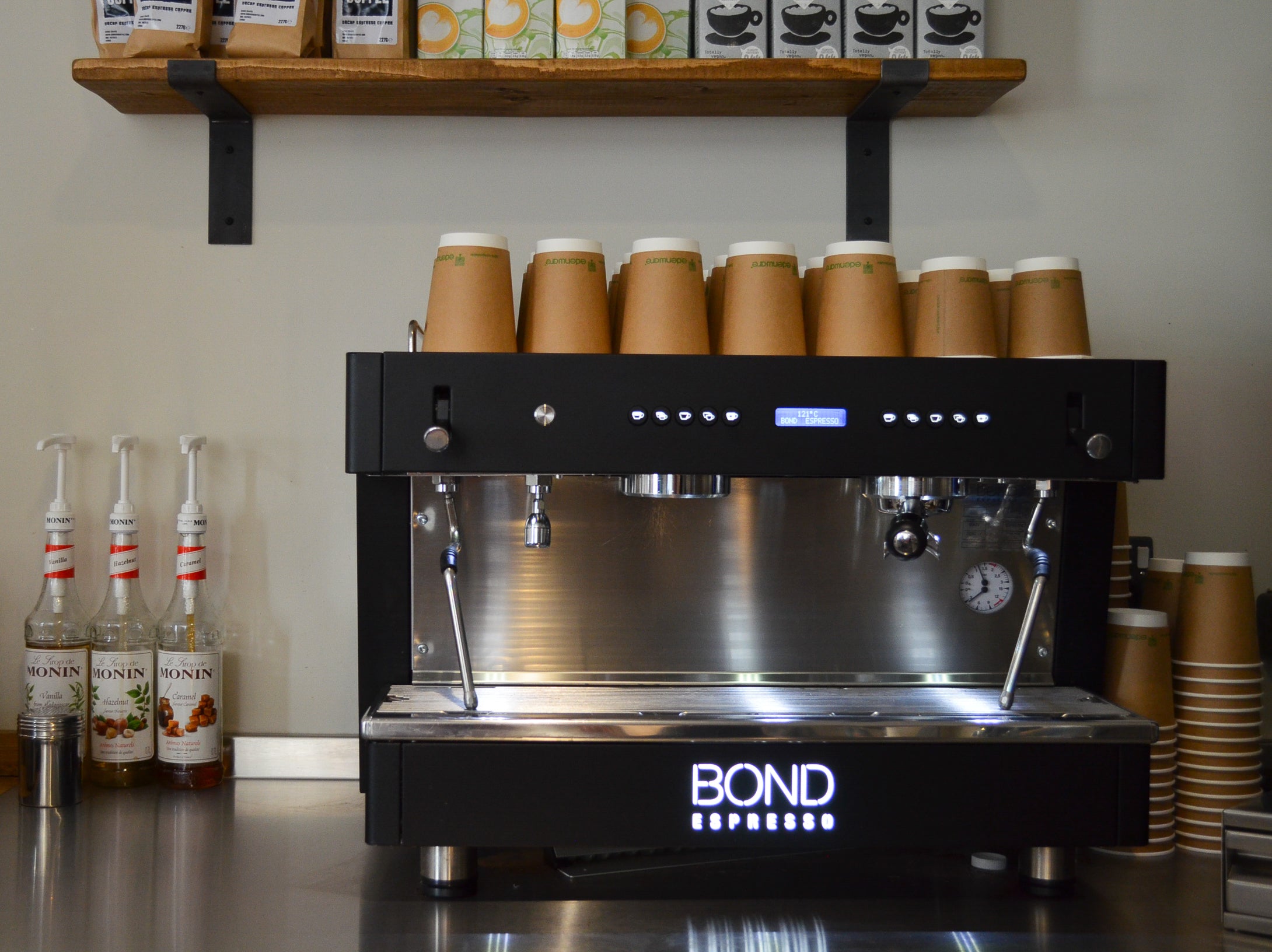 Bond Espresso 2 Group commercial espresso machine with twin steam wands, hot water outlet, and stainless steel body.